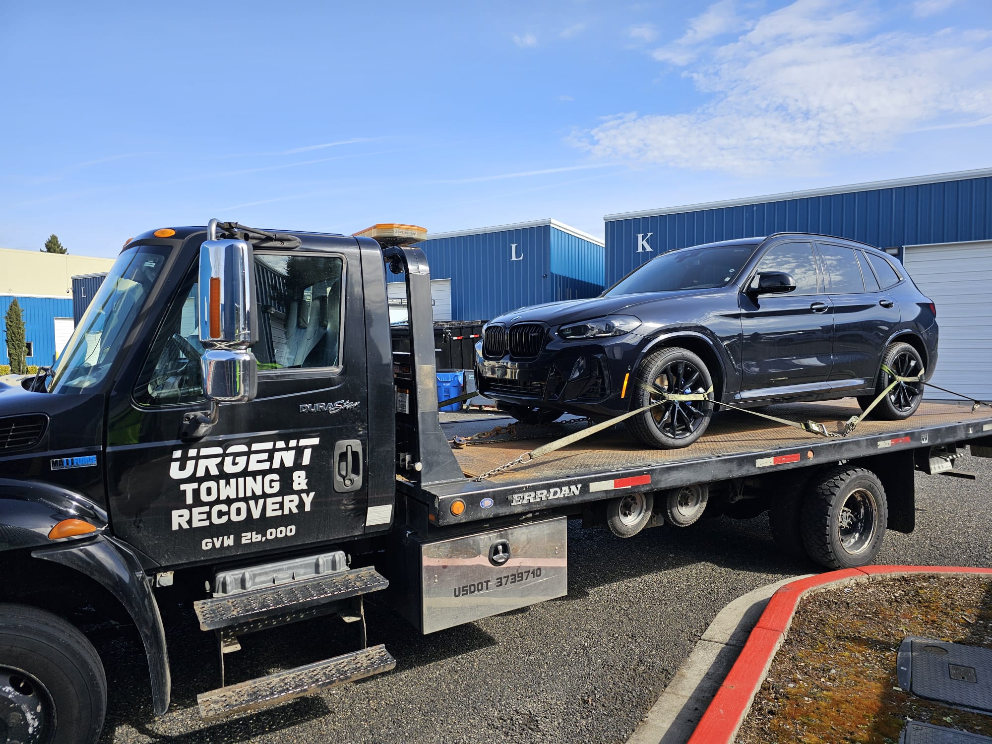 Urgent Towing flatbed truck with BMW